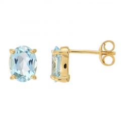 Puces d'oreilles Or jaune 375 Topaze Bleue Ovale 8x6mm