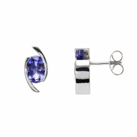 Boucles d’oreilles en Or Blanc 750 serties de tanzanites ovales. Pierres ovales de 7x5mm (2x0,75 carat) serties demi-clos....