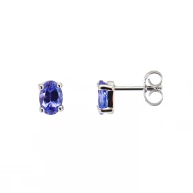 Boucles d&#39;oreilles en Or Blanc 750 et Tanzanites AAA. Ces Boucles sont serties de deux tanzanites ovales de 6x4mm. Le ...